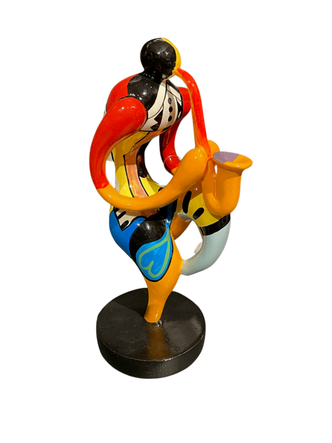 Colourful Figurine Playing the Saxophone