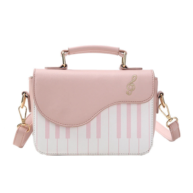 Pink Handbag with White Keyboard and Gold Embroided Treble Clef