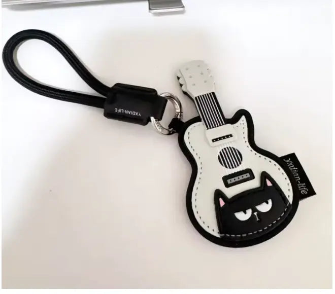White Guitar Keyring with a Cartoon Cat Leather