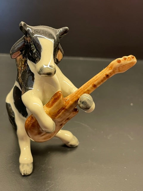 Cow Playing the Guitar Porcelain Figurine