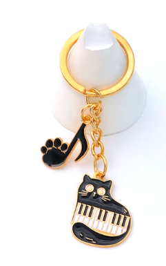 Keyring Cat Cuddling Keyboard with Black Paw Note
