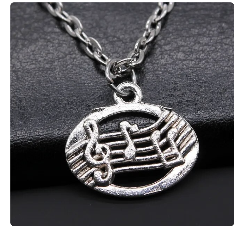 Silver Pendant with Necklace Manuscript with Notes