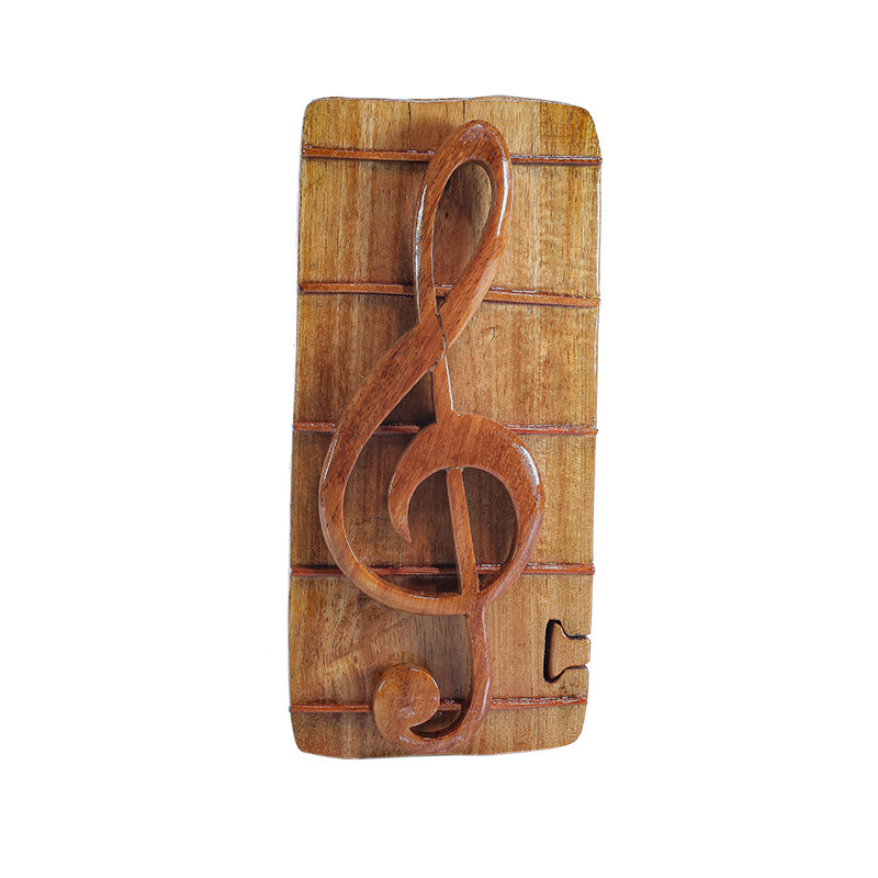 Secrets Box with a Treble Clef and Staff on the Top.
