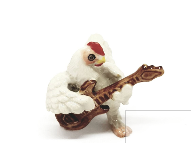 Porcelain Figurine Hen Playing the Guitar
