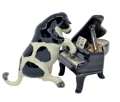 Cow Playing the Piano Porcelain Figurine