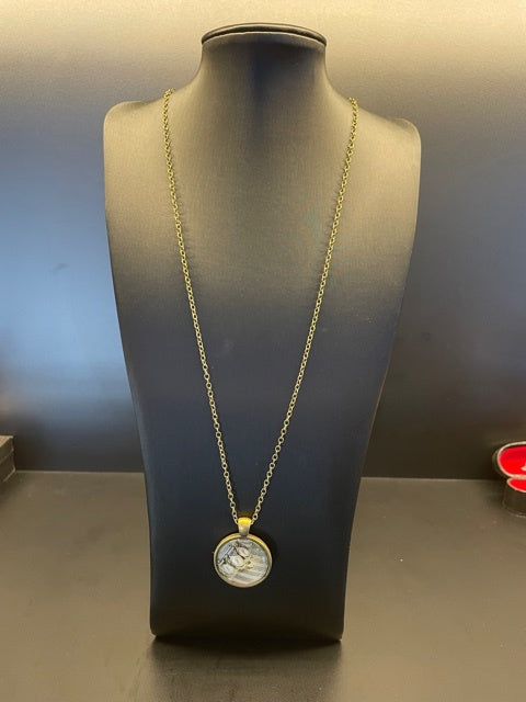 Flute Necklace Bronze with Flute and Manuscript in Clear Dome Shape Pendant