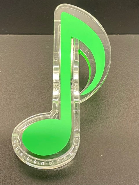 Green Paper Clip in the Shape of a Quaver.