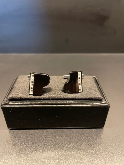Black Cufflinks in the Shape of a Grand Piano.