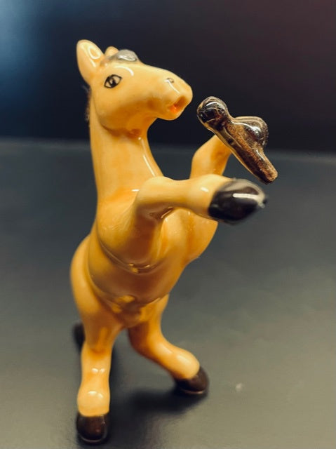 Porcelain Figurine Horse Singing with a Microphone