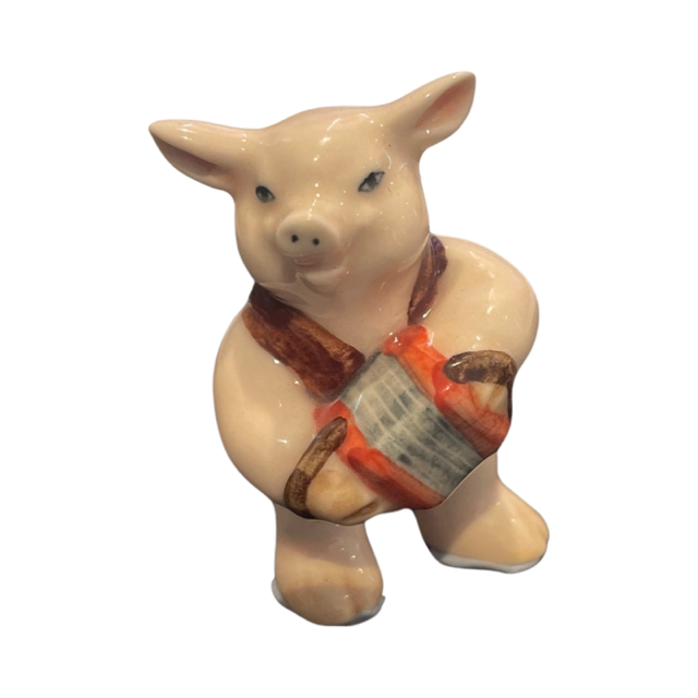 Porcelain Pig playing Accordian