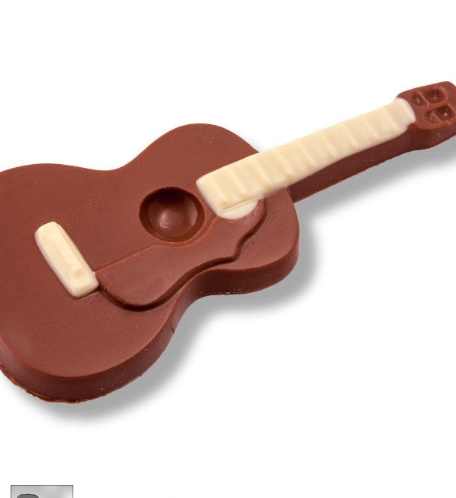 Plastic Chocolate Mould in the Shape of an Acoustic Guitar.