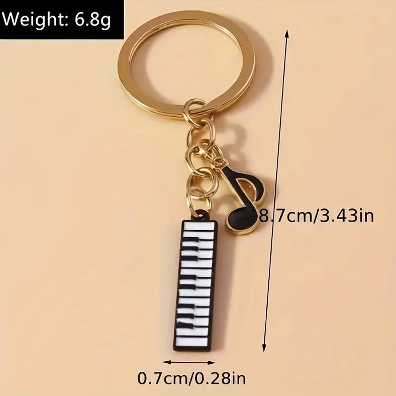 Gold Keyring with a Keyboard and Quaver.