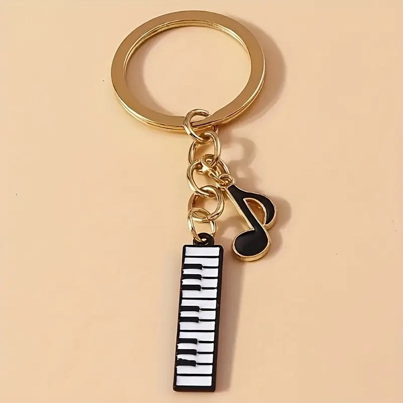 Gold Keyring with a Keyboard and Quaver.