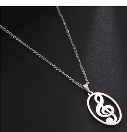Silver Treble Clef Pendant in an Oval Frame with Chain