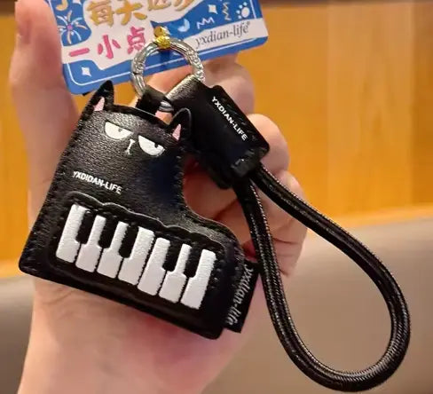 Grand Piano Keyring with a Cartoon Cat Leather