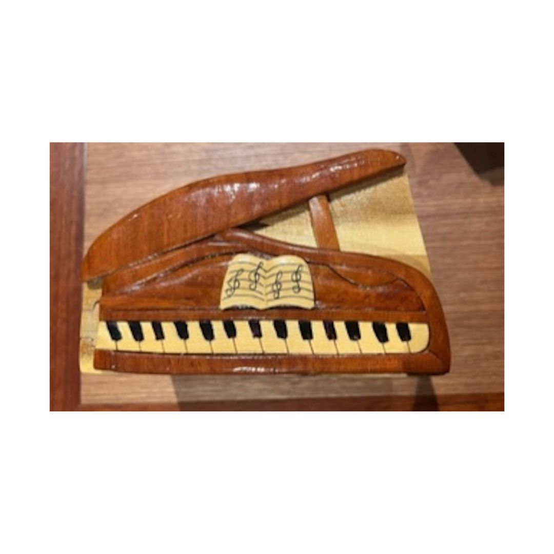 Secrets Box in the Shape of a Grand Piano.