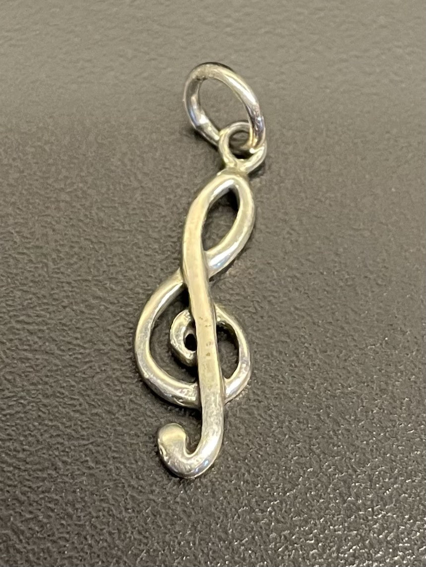 Sterling Silver Treble Clef Pendant.