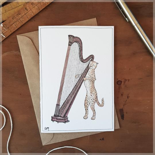Greeting Card -a cheetah playing the harp.